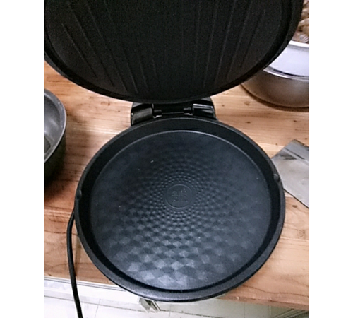 电饼铛通电指示灯亮但上下铛都不加热,这是什么原因